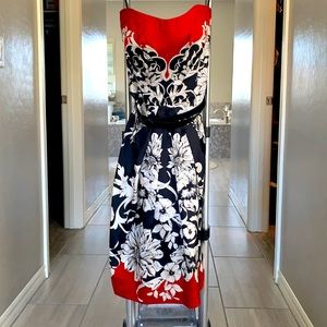 Black and red strapless cocktail dress